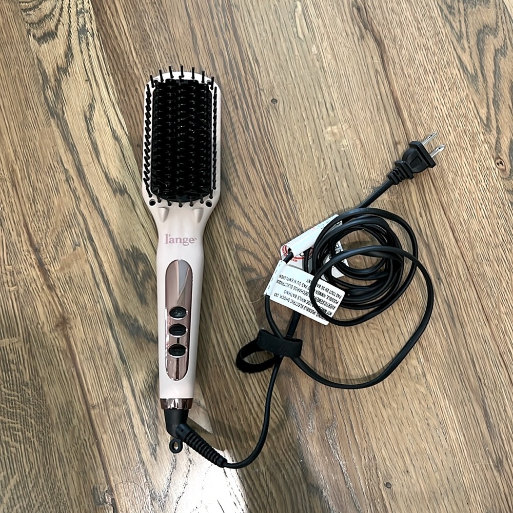 Lange hair straightening brush used once